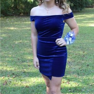 Off the shoulder navy velvet dress. Bought from dillards. Only WORN ONCE!